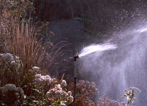 This is a photo of one of the garden water sprinklers by the house in full cry. This is a photo of one of the garden water sprinklers by the house in full cry.